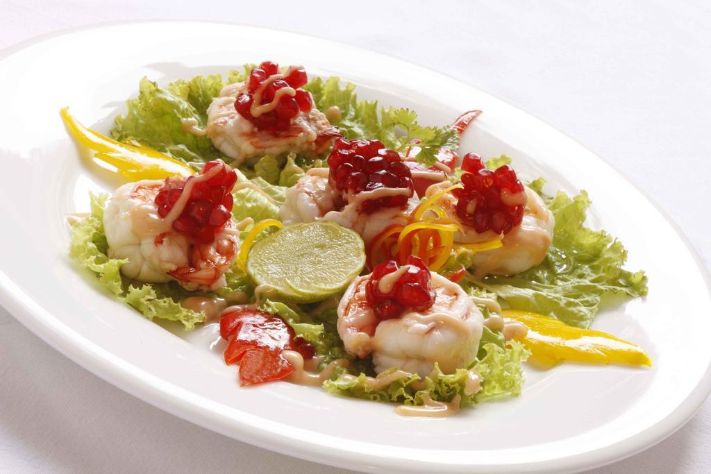 Heritage Maduraj Zewnętrze zdjęcie A salad of scallops